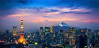 Aerial,View,Of,Tokyo,Cityscape,With,Fuji,Mountain,In,Japan.